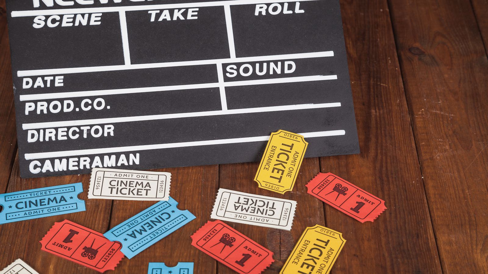 Collage of movie posters, book covers, and cultural ephemera arranged on a bulletin board